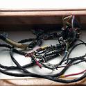 Here's the original Yanmar cables; a short one at the engine end, another at the panel and a long extension in the middle.  Upon removal, I was not impressed.  The wire used for the sender lines was quite small gauge, untinned copper (and heavily corroded as a result) made up of not very many strands.  This was HARDLY marine quality wire.  I also found a whole lot of unused connectors, unused wire, multiple jumpers .. nothing that made me happy.  Now, to be fair, it HAD worked for thrity years but it did not give me a warm and fuzzy feeling.