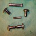 The difficult bit is replacing the pop rivet that the sheave turns on.  While they can be drilled out in situ, installing a new op rivet is almost impossible.  However, the local stainless fastener supplier makes some very cool "nuts".  Add a short bit of threaded rod and some permanent locktite and you have wonderful replacement, easily as strong as the original.