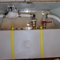 And the plumbing now done.  One change from the conventional is the venting.  Typically, a holding tank would use a single 3/4" vent.  However, another source of smell is said to be caused by anerobic bacteria (that result when there's not enough oxygen) breaking down the waste.  Aerobic bacteria though, do not smell, and so the more air that goes through the tank, the better.  I went with two 1" vents, for better than 4 times the ventilation.