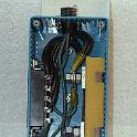 A 6 gauge cable comes up from the main power switch and into this box where it goes to an ammeter shunt, mounted on the yellow nylon spacer on the left.  The other side of the shunt goes to a 10 pin high current connector, shown on the left.  The shunt is connected to a circular MIL connector, on the top, which everntually gets to the ammeter.