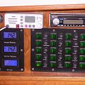 And here's the electrical area, now complete.  Since nothing in this opening is square, parallel or perpendicular, everything on the plate looks crooked.  Life with a boat.