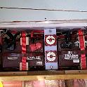 And the completed battery area.  In the middle are two cutout switches.  The battery positives go directly to these switches, so it's possible to COMPLETELY disconnect one or both batteries.  On the left is windlass breaker, sandwiched between a pair of fuse blocks.  These blocks, one for the House battery, one for the Starter battery, handle anything that does not go through the main House Power switch.   Currently, this includes the AC battery charger, the solar cell and the bilge pumps.  These of course have fuses at the far end as well, so things are fused coming and going.