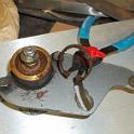 Removing the pulley off the water pump revealed a WHOLE lotta rust, so much that the next decision .. cross my fingers and hope or do something about it .. was an easy one.  SOMETHING had to be done.